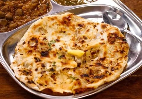 Amritsari Kulcha (1 Butter Dipped Kulcha with Choley) - The Kulcha Land, Amritsar